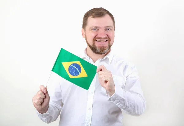 Homem Segurando Uma Bandeira Brasil Fundo Cinza — Fotografia de Stock