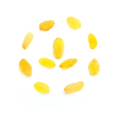 Beyaz bir arka plan üzerinde üstten görünüm altın kuru üzüm bir daire. Daire içinde bir sembol ile. Kuru sarı üzüm.