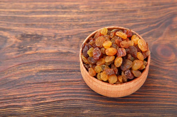 Bowl Raisins Wooden Background Dried Grapes — Stock Photo, Image