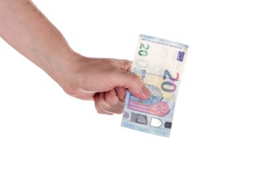 Bir adamın elini 20 Euro banknot tutar. 20 euro para birimi.