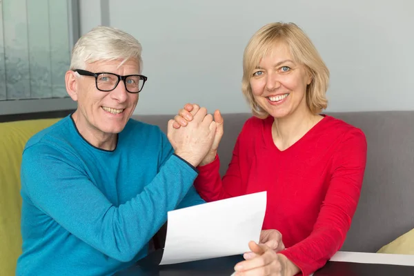 Happy Couple Middle Aged People Holding Hands Agreement Sitting Table — Stock Photo, Image