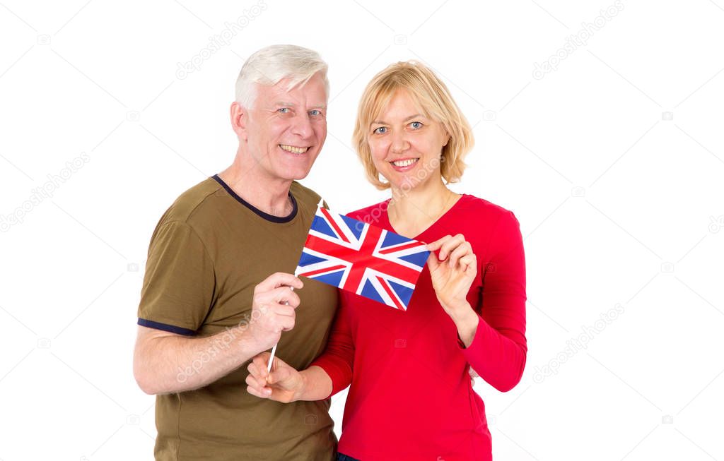 Adult couple, man and woman, middle-aged with a flag of Great Britain on a white background. English family.