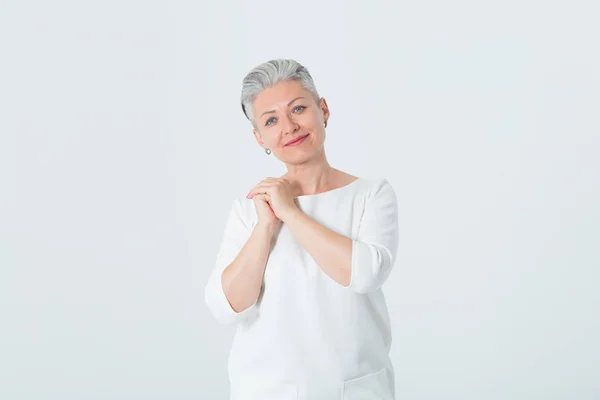 Portrait Happy Mature Woman White Dress Standing Light Background — Stock Photo, Image