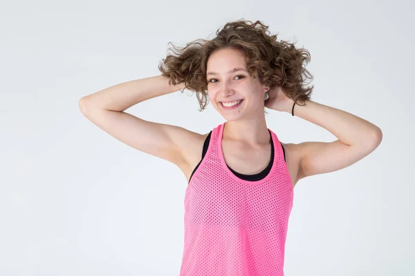 Portrait Beautiful Young Woman Pink Clothes Fitness Standing Light Background — Stockfoto