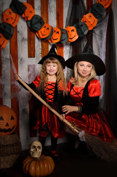 Halloween Scene Two Attractive Witches Young Mother Little Daughter Costumes — Stock Photo, Image