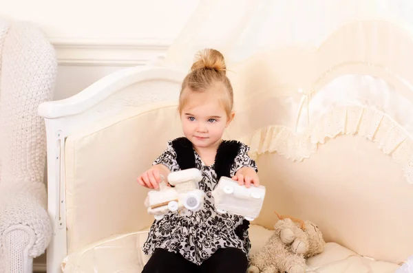 Little Cute Girl Plays Toy Knitted Train Sitting Bright Room — Stock Photo, Image