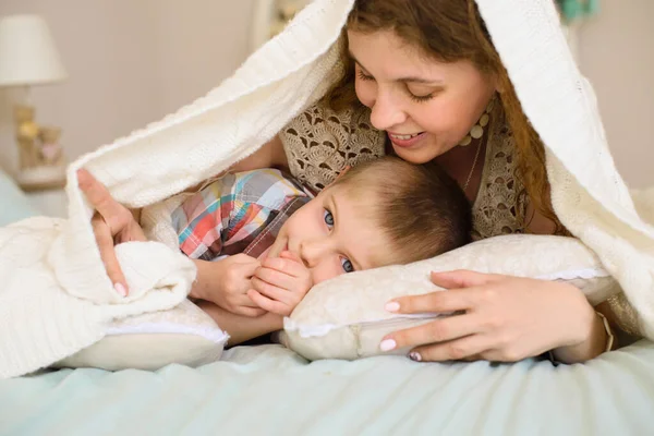 Mom Gently Looks Her Son Lying Bed Covered Bedspread Bright — Stock Photo, Image