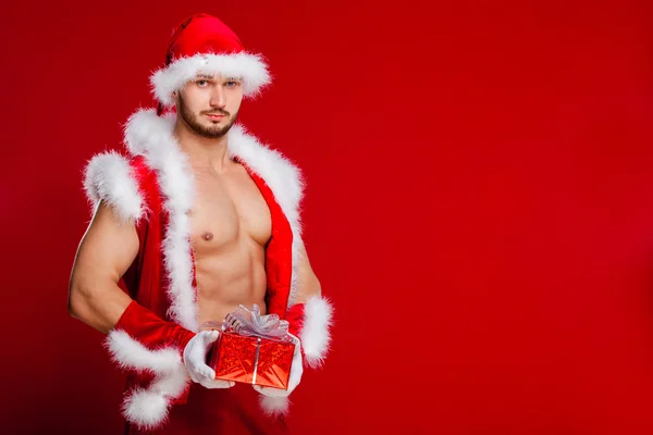 Sexy santa claus ma dla was niespodziankę — Zdjęcie stockowe