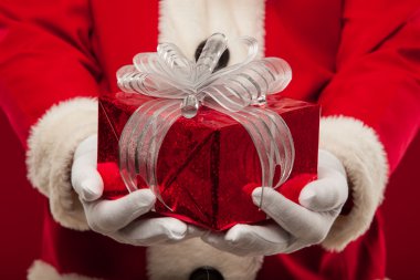 Fotoğraf xmas hediye veriyor ve cam seyir tür Santa Claus