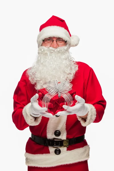 Jultomten: Glada med liten Stack av gåvor — Stockfoto