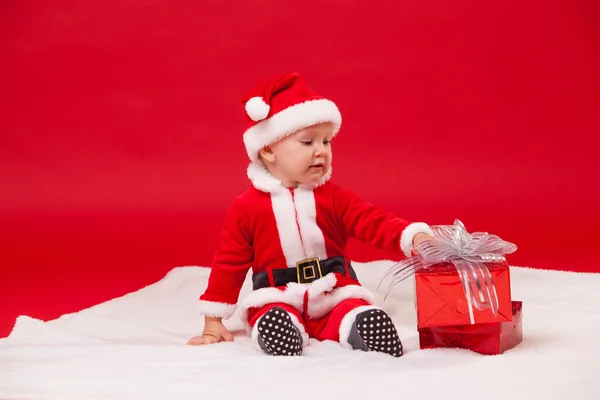 Beautiful little baby celebrates Christmas. New Years holidays. — Stockfoto