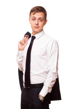 Genç yakışıklı işadamı bir ceket cebinde bir elini ve öte yandan tutuyor. Beyaz arka plan üzerinde izole portre