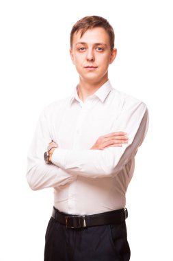 Genç yakışıklı işadamı Beyaz gömlekli düz duran ve elleri, beyaz arka plan üzerinde izole dikey geçiş