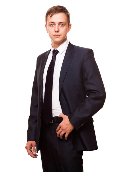 Νεαρός επιχειρηματίας όμορφος σε μαύρο κοστούμι στέκεται ευθεία, κατακόρυφος που απομονώνονται σε λευκό φόντο — Φωτογραφία Αρχείου