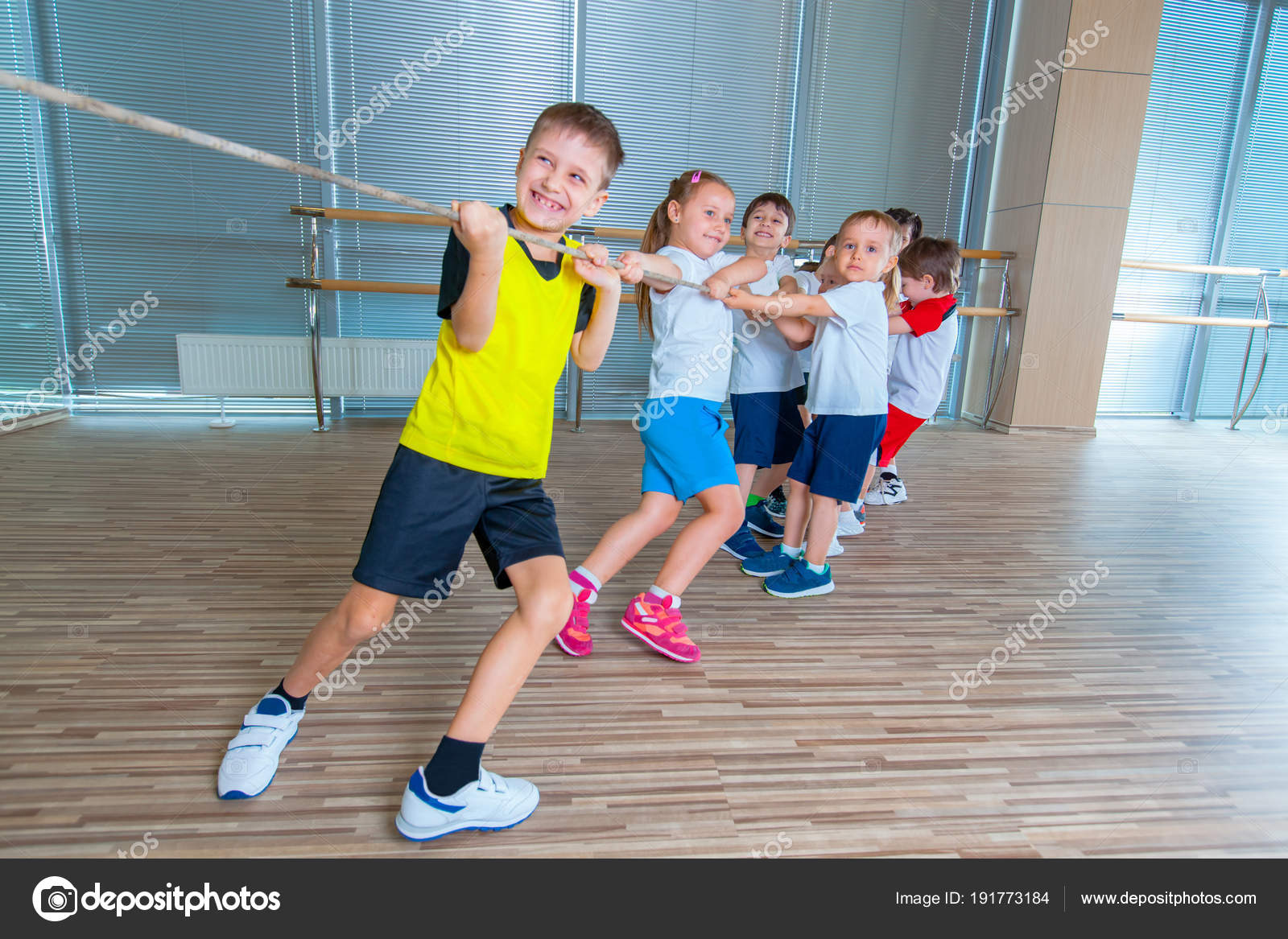 Children And Recreation Group Of Happy Multiethnic School Kids Playing Tug Of War With Rope In Gym Stock Photo Image By C Satyrenko 191773184 Poslednie tvity ot kids play gym (@kidsplaygymin). depositphotos