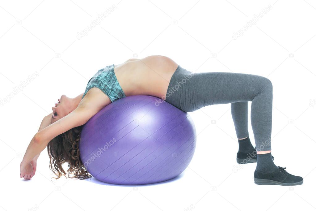 Portrait of a beautiful young pregnant woman exercises with fitball. Working out and fitness, pregnancy concept. Isolated white background.