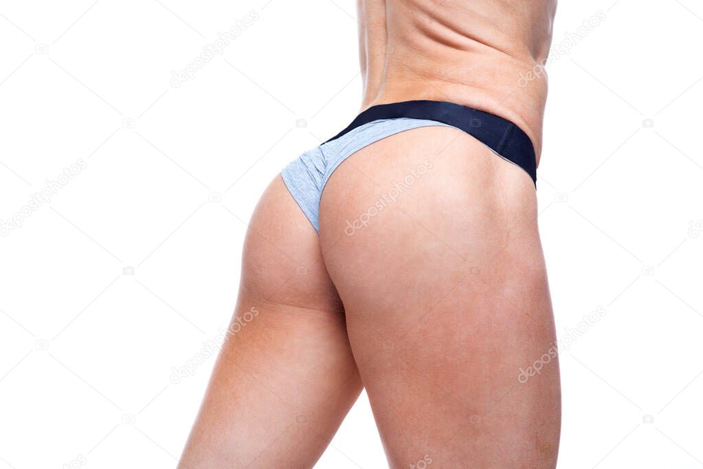 Close-up of woman athletic sexy buttocks isolated on white background