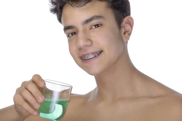 Teen boy wearing braces on white background — Stock Photo, Image