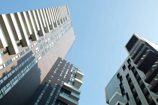 Two huge modern residential buildings against the blue sky. 01.20 Milan. — Stock Photo, Image