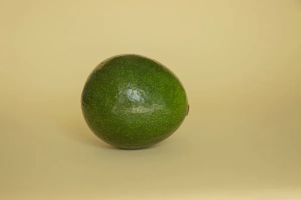 Ripe fruit on a yellow background. — Stock Photo, Image