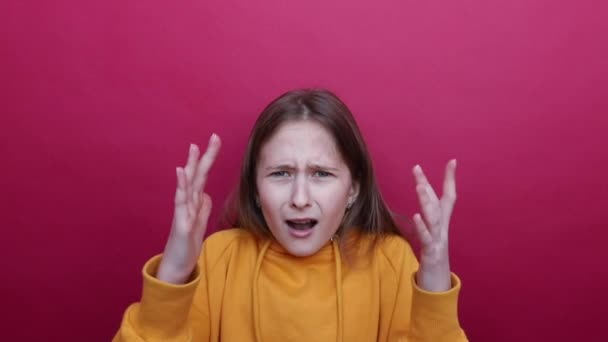 Girl shows gesture meaning what are you doing? — Stock Video