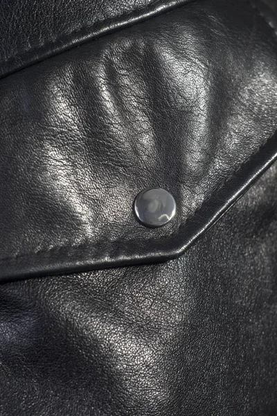 Close-up of the texture of the pocket of a high-quality leather jacket. Promotional photo — Stock Photo, Image