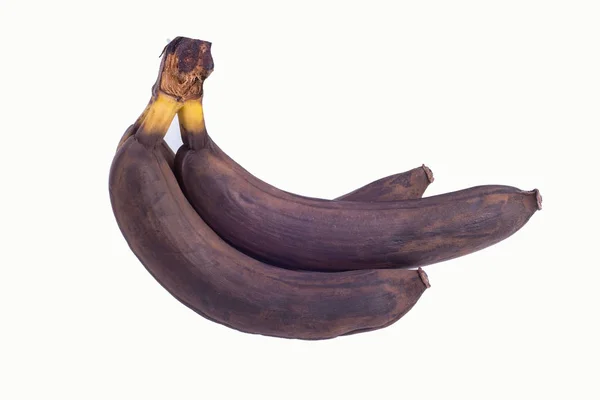 Izolované na bílém pozadí hnědé ne čerstvé několik banánů — Stock fotografie