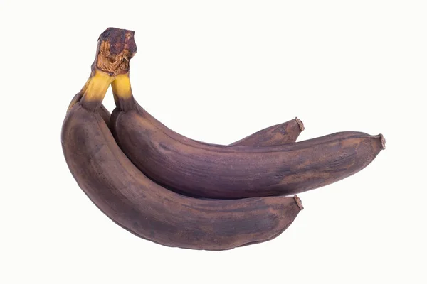 Изолированные на белом фоне коричневый не свежий несколько бананов — стоковое фото