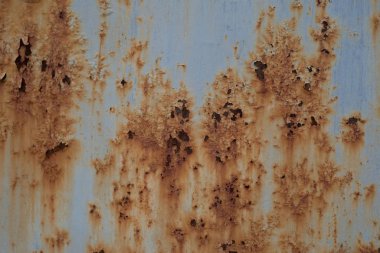 Paslı eski metal dokusu. Arka plan için boşluk, reklam için boş alan. Metal bir çitin üzerindeki pas. Soyut arkaplan