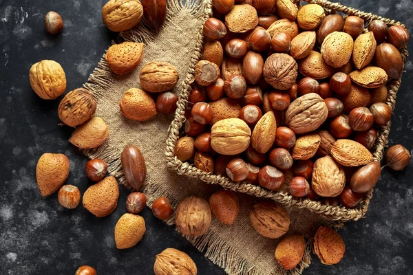 Mix of different kinds of nuts in shell — Stock Photo, Image