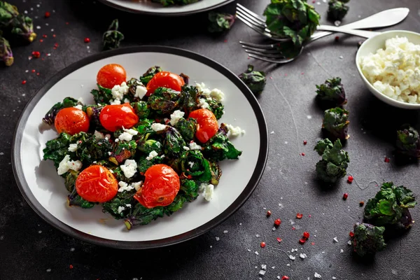 Homemade Roasted Green Kalettes salad with cherry tomatoes and feta cheese. healthy food — Stock Photo, Image