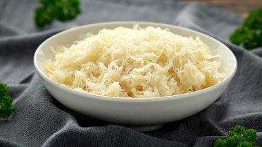 Fresh pickled cabbage in white bowl. healthy winter food
