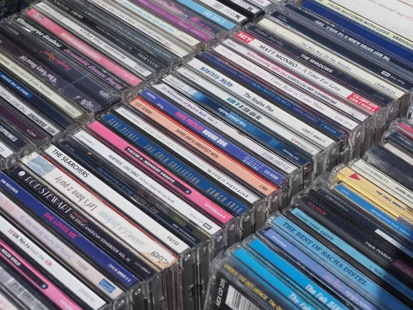 Close up of a stack of various compact discs, cds — Stok fotoğraf