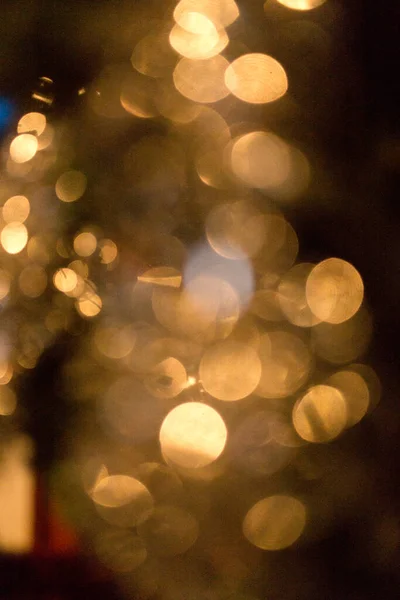 Boże Narodzenie zdekoncentrowane złote światła i musujące nadaje się jako tło — Zdjęcie stockowe