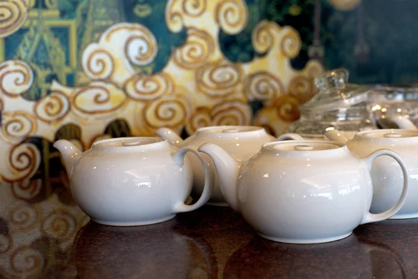 White chinese teapot in restaurant — Stock Photo, Image