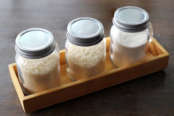 Azúcar y crema en botella de vidrio — Foto de Stock