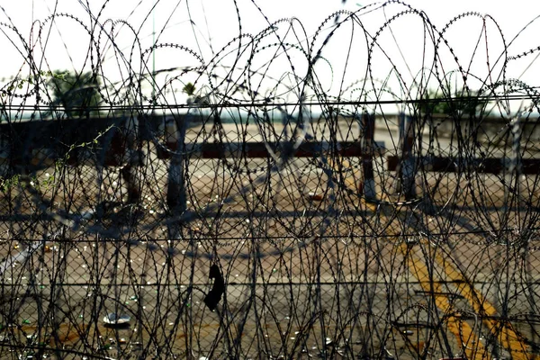 Barbed tape or razor wire — Stock Photo, Image