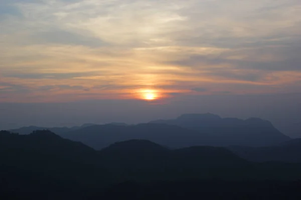 Beautiful sunrise over the hill — Stock Photo, Image