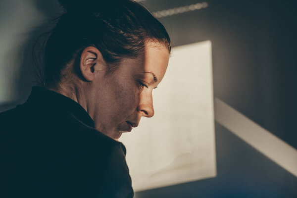 Portrait of a woman alone and depressed