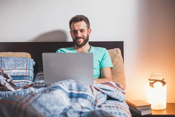 Young Man Lying Bed Working Laptop — Stock Photo, Image