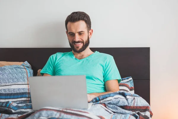 Young Man Lying Bed Working Laptop — Stock Photo, Image