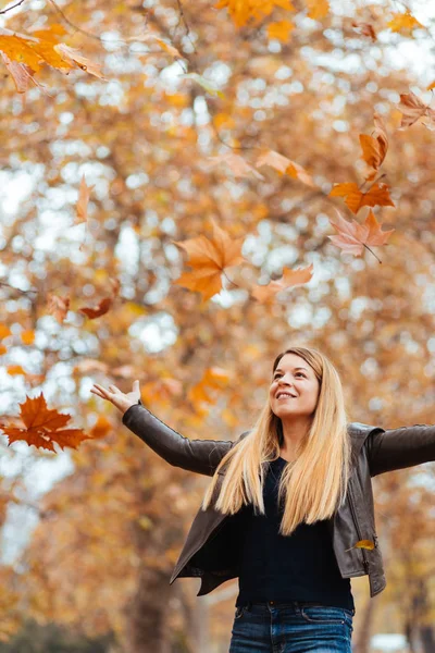 Young Woman Throwing Yellow Autumn Leaves Air — Stock Photo, Image