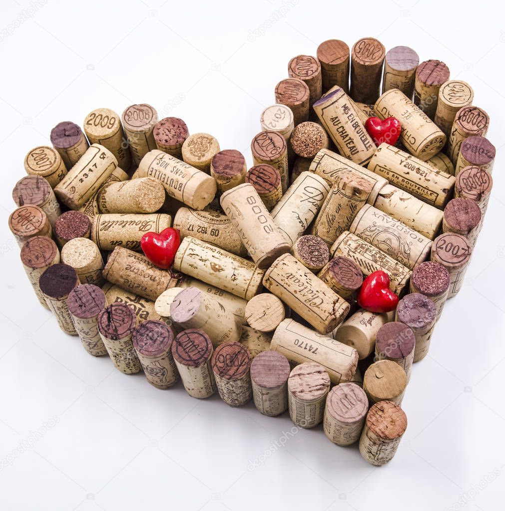 Father's day celebration valentine made of wine corks coupled with red hearts.