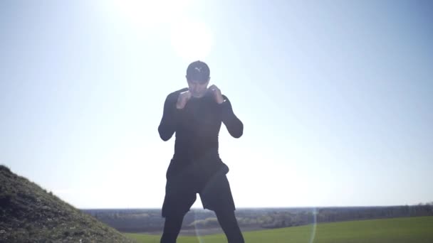 Guy Struggles Shadow Boxing Field Field Guy Island Field — Stock Video