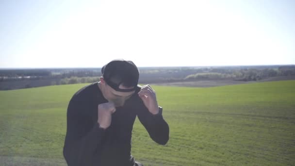 Guy Struggles Shadow Boxing Field Field Guy Island Field — Stock Video