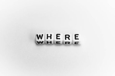 White cubes with question WHERE on white background clipart
