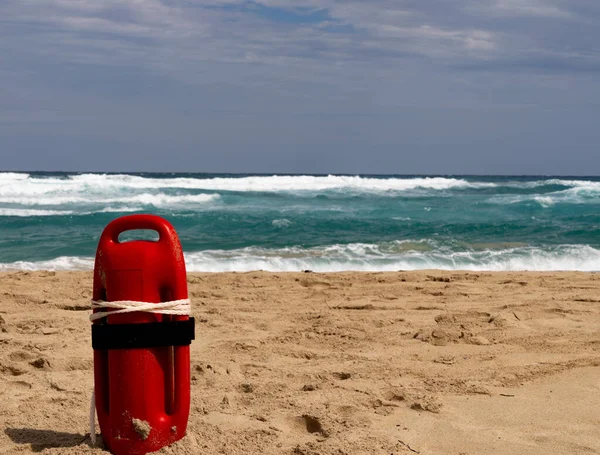 Bouée de baïonnette rouge à la plage Photos De Stock Libres De Droits