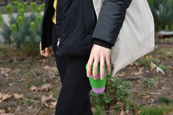 Woman hand holds eco coffee cup.Sustainable lifestyle concept. — ストック写真