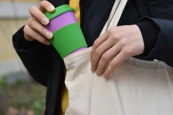 Female Hands Holding Reusable Coffee Cup Putting Bag Outdoors Zero — Stock Photo, Image