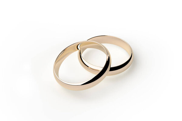 Wedding rings on the white background.